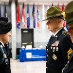 Uniformed soldiers in a military ceremony displaying pride and discipline in Knoxville, Tennessee.